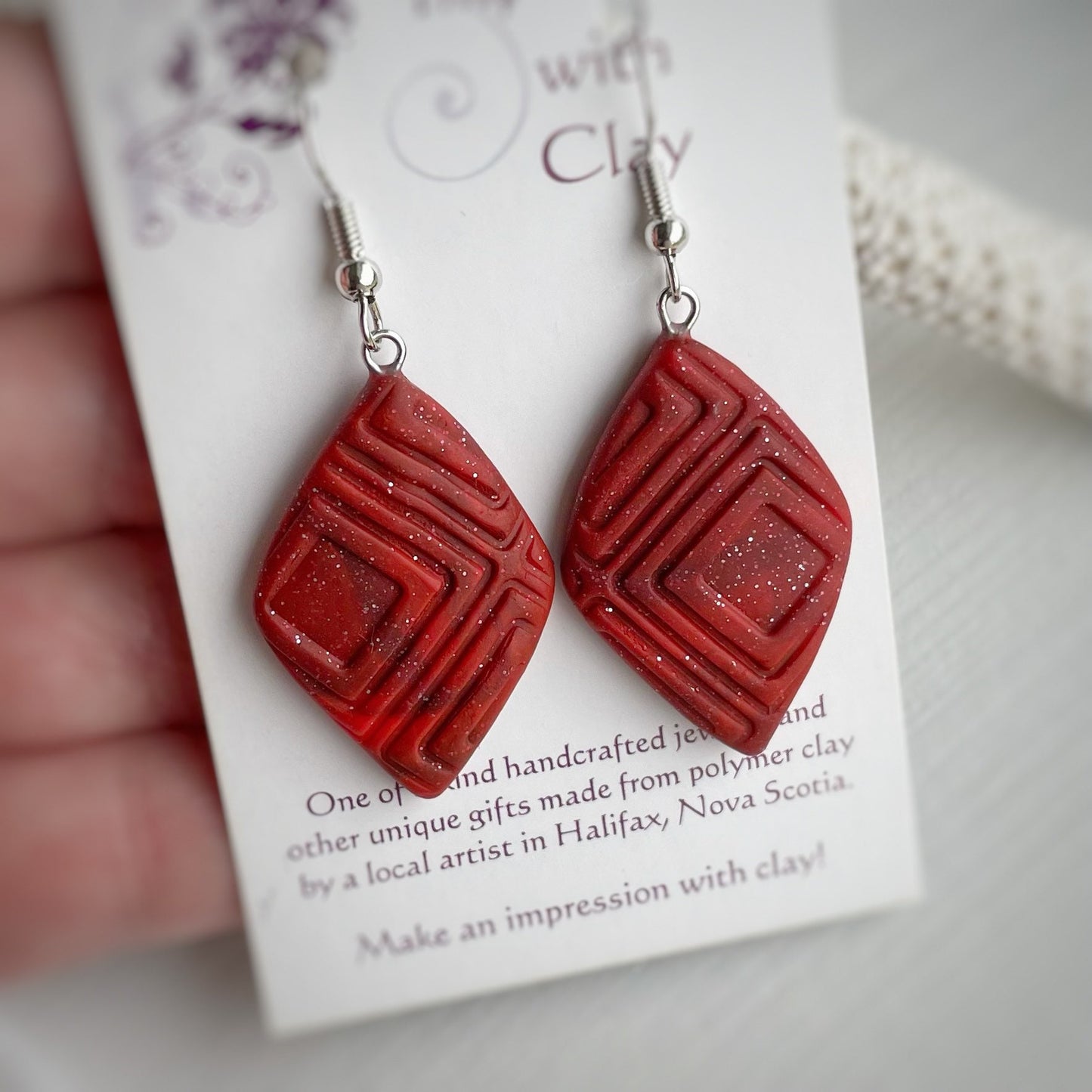 Red dimensional abstract imprint large triangular earrings, IWC earrings