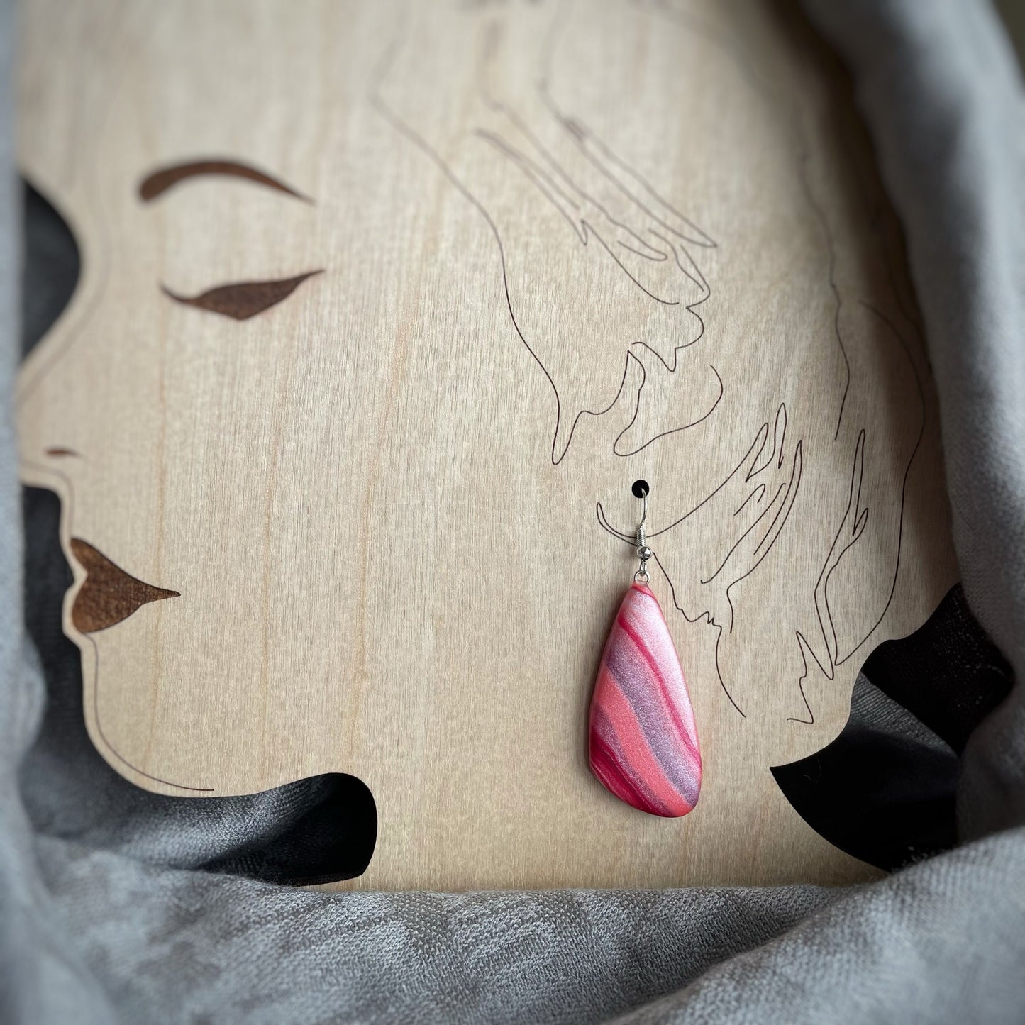 It’s all peachy. Shades of peach large abstract triangular earrings
