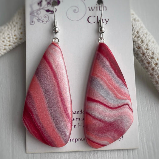 It’s all peachy. Shades of peach large abstract triangular earrings