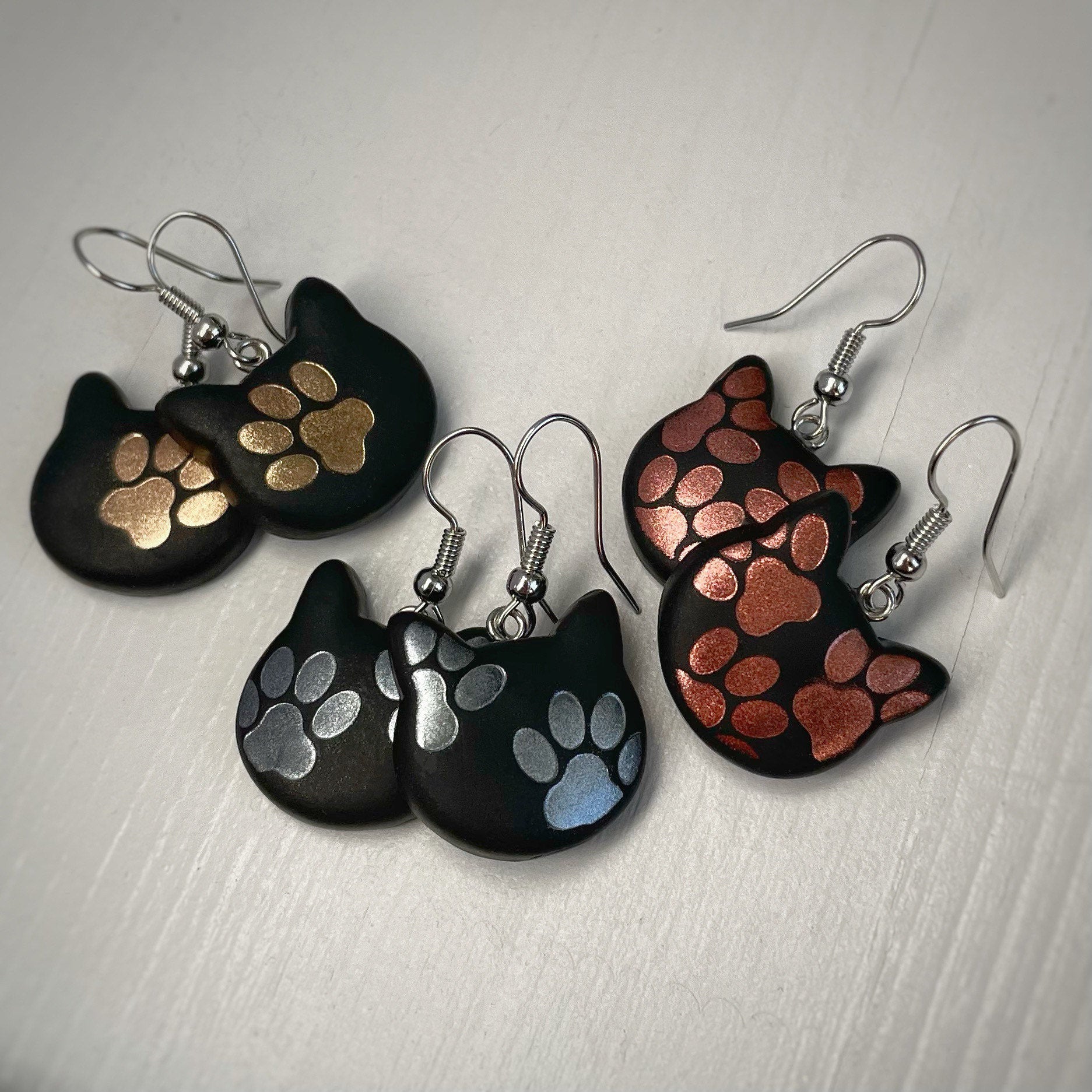 Cat paw deals print earrings